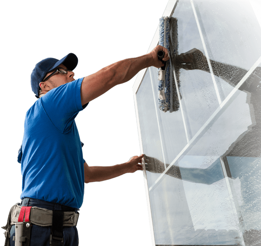 Professional window cleaner cleaning large glass window